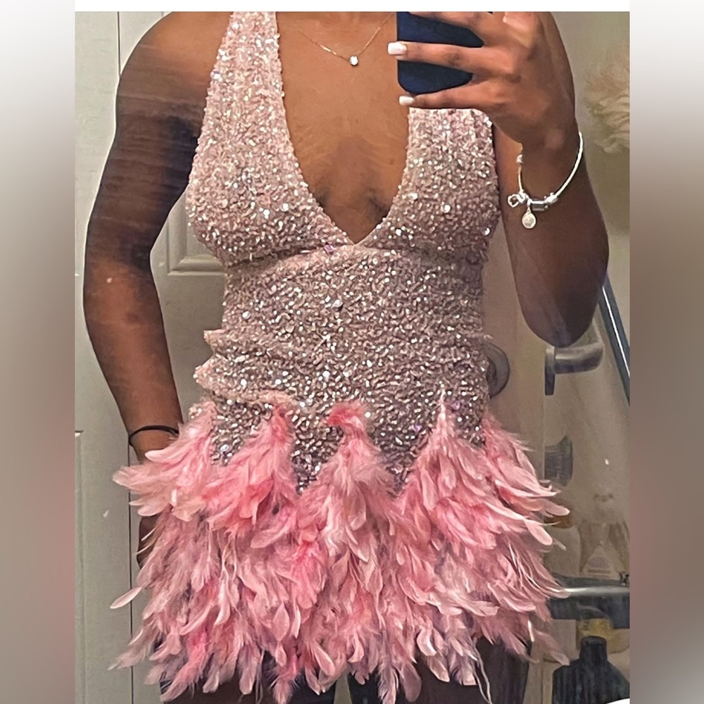 Pink sequin and feather mini dress